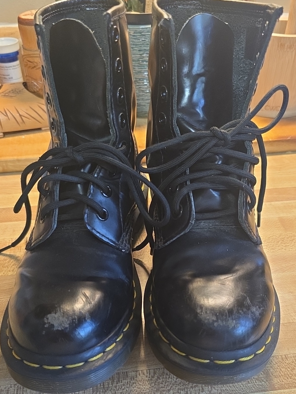 Dr. Martens Distressed Black Leather Lace-Up Combat Boots with Yellow Stitching